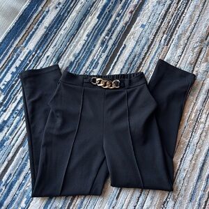 Elegant Black Women's Pants with Gold Chain Detail